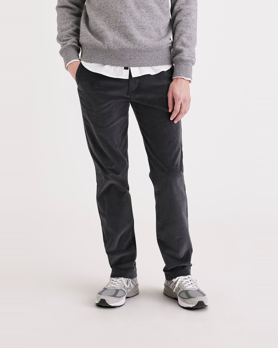 Front view of model wearing Asphalt Men's Slim Fit Smart 360 Flex Alpha Chino Pants.