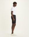 Side view of model wearing Beautiful Black Men's Supreme Flex Modern Chino Short.