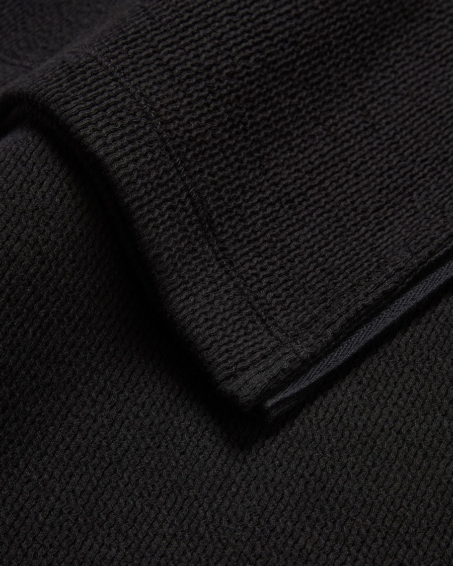 View of model wearing Beautiful Black Rib Dress with Lofi Knit, Slim Fit.