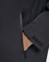 View of model wearing Black Go Rain Commuter Jacket.
