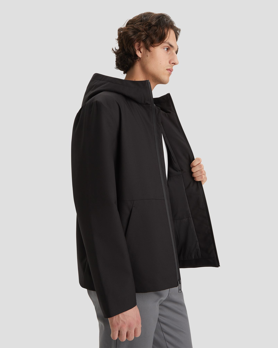 View of model wearing Black Men's Softshell Modern Jacket.