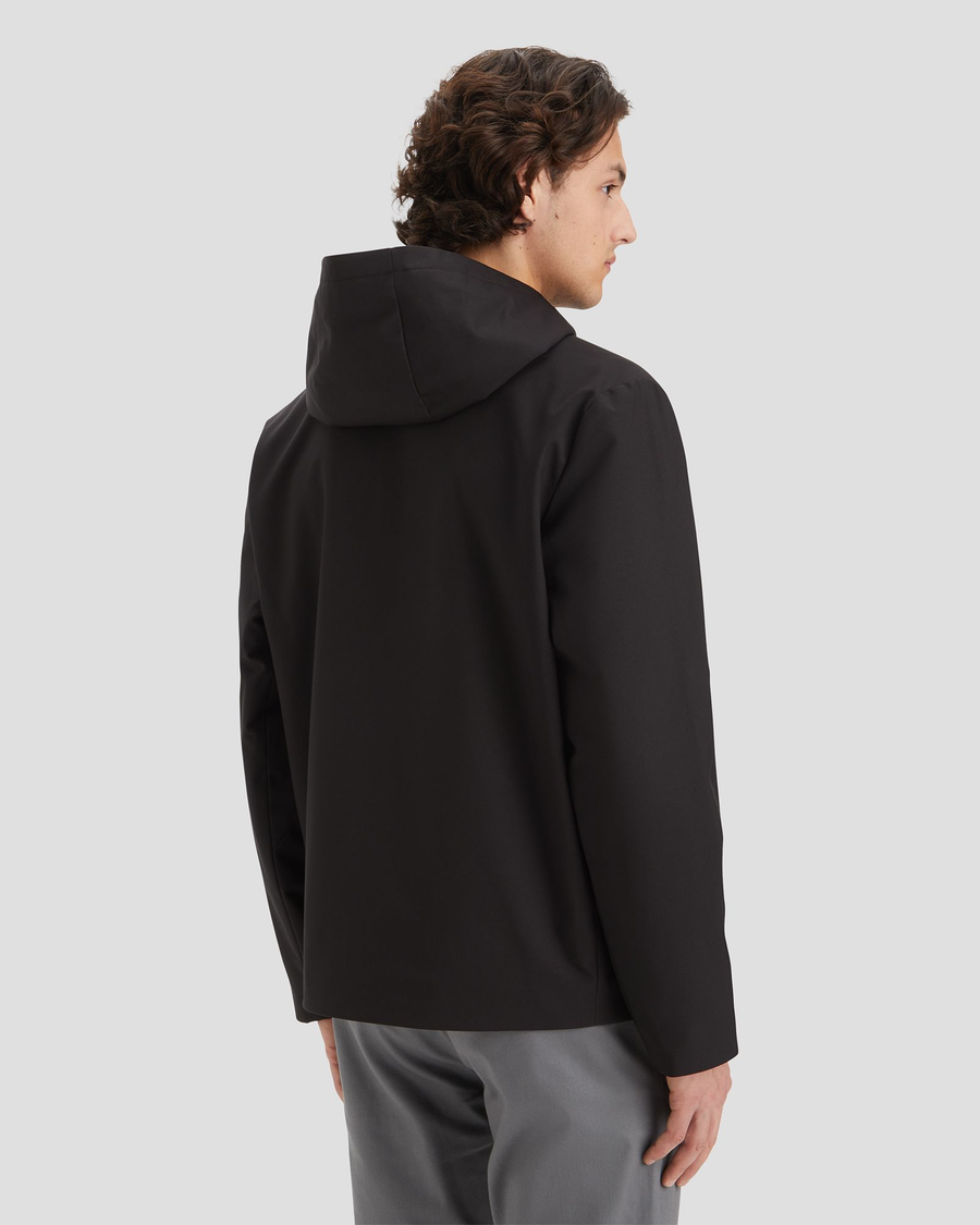 Back view of model wearing Black Men's Softshell Modern Jacket.