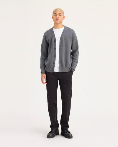 Front view of model wearing Black Ultimate Chinos, Slim Fit.