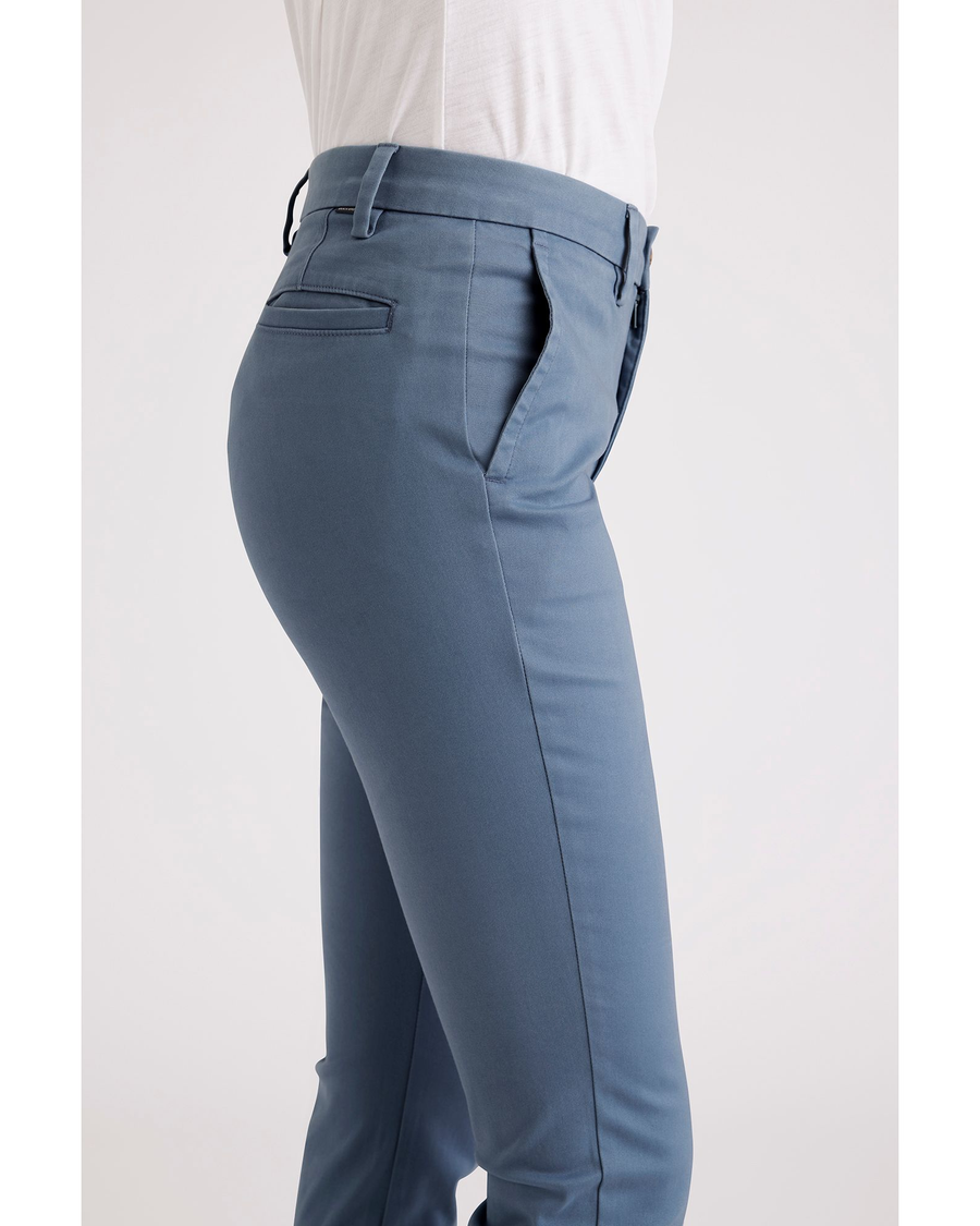 Side view of model wearing Bluefin Women's Skinny Fit Chino Pants.