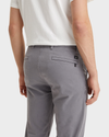 View of model wearing Burma Grey Men's Slim Fit Smart 360 Flex Alpha Khaki Pants.