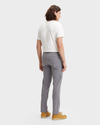 Back view of model wearing Burma Grey Men's Slim Fit Smart 360 Flex Alpha Khaki Pants.