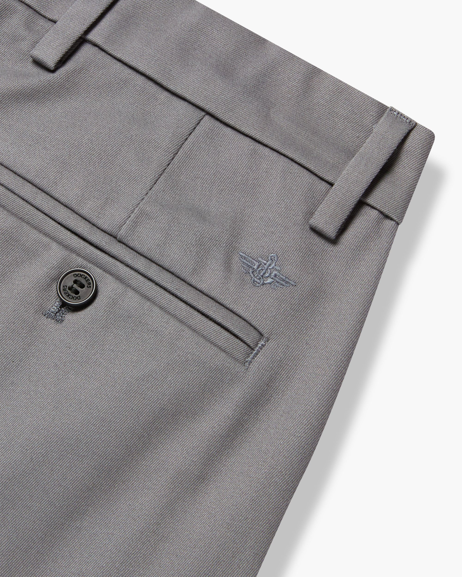 View of model wearing Burma Grey Signature Iron Free Khakis, Skinny Fit with Stain Defender®.