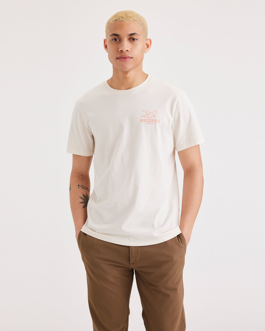 Front view of model wearing Buttercream Men's Slim Fit Logo Tee.