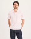 Front view of model wearing Calcite Pique Polo, Slim Fit.