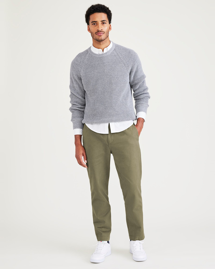 Front view of model wearing Camo Men's Straight Tapered Fit California Pull-On Pants.