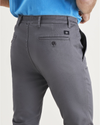 View of model wearing Car Park Grey Men's Skinny Fit Original Chino Pants.