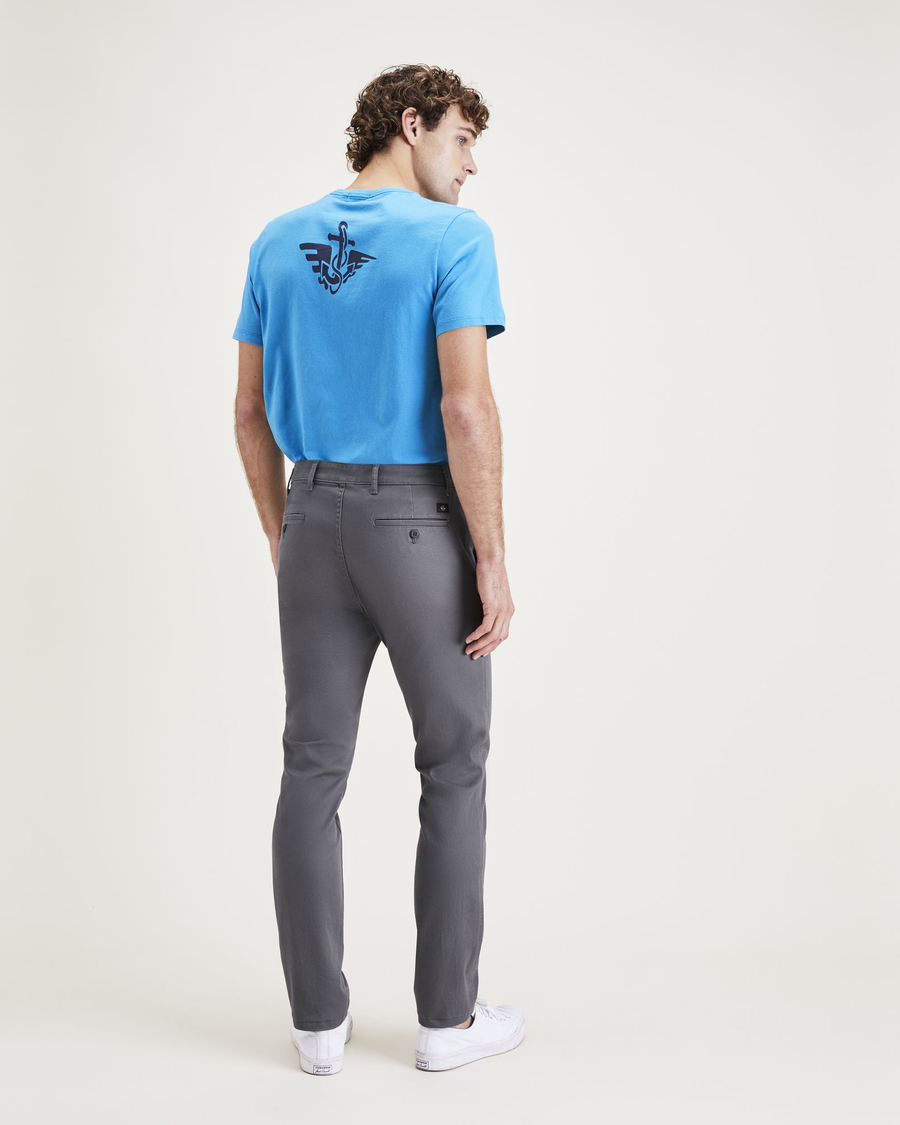 Back view of model wearing Car Park Grey Men's Skinny Fit Original Chino Pants.