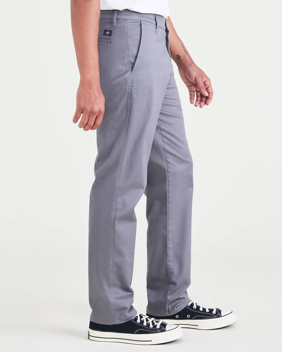 Side view of model wearing Car Park Grey Men's Slim Fit Original Chino Pants.