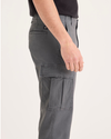 Side view of model wearing Car Park Grey Utility Cargo Pant, Straight Fit.