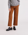 Front view of model wearing Caramel Café Women's High Straight Fit Weekend Chino Pants.