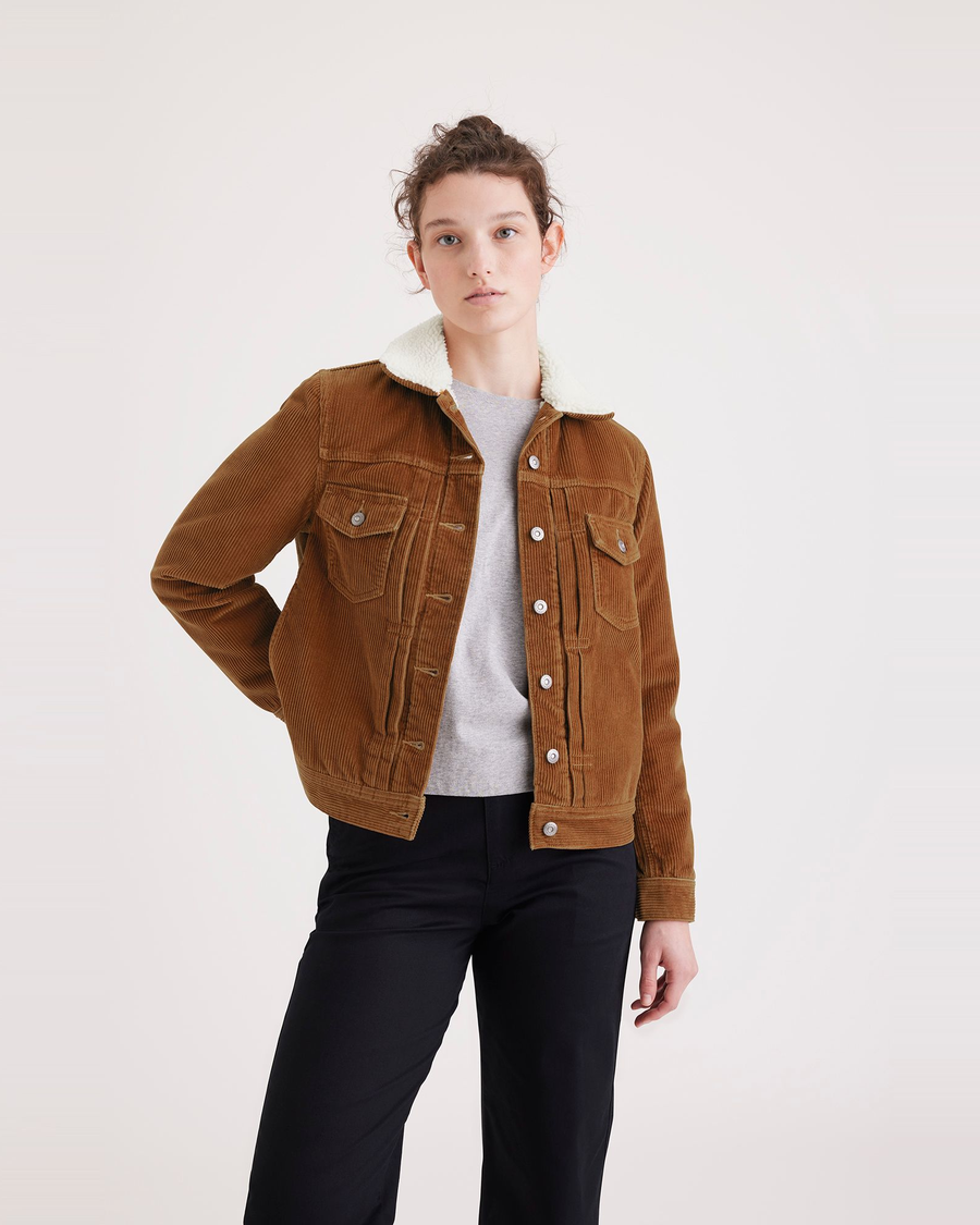 Front view of model wearing Caramel Cafe Women's Regular Fit Original Sherpa Trucker Jacket.