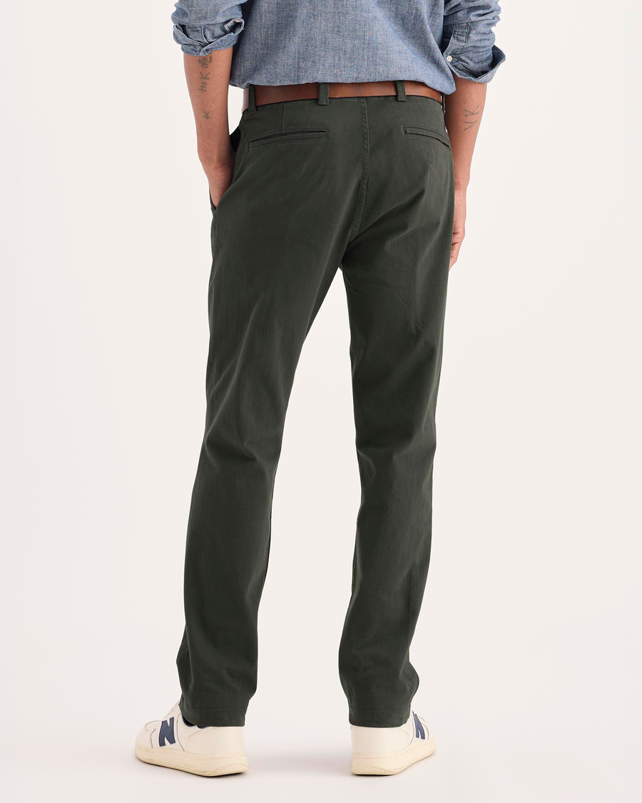 Back view of model wearing Chimera Alpha Chino Pants, Slim Fit.