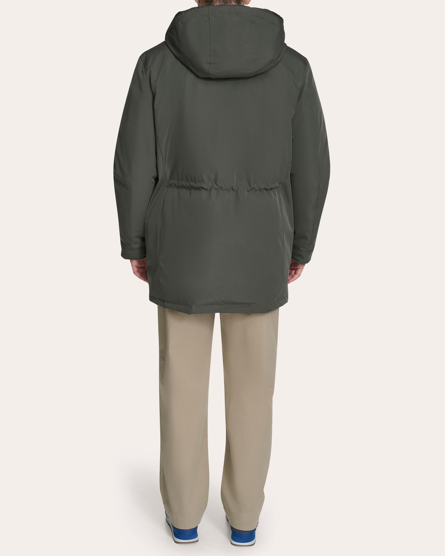 Back view of model wearing Chimera Faille Padded Parka.