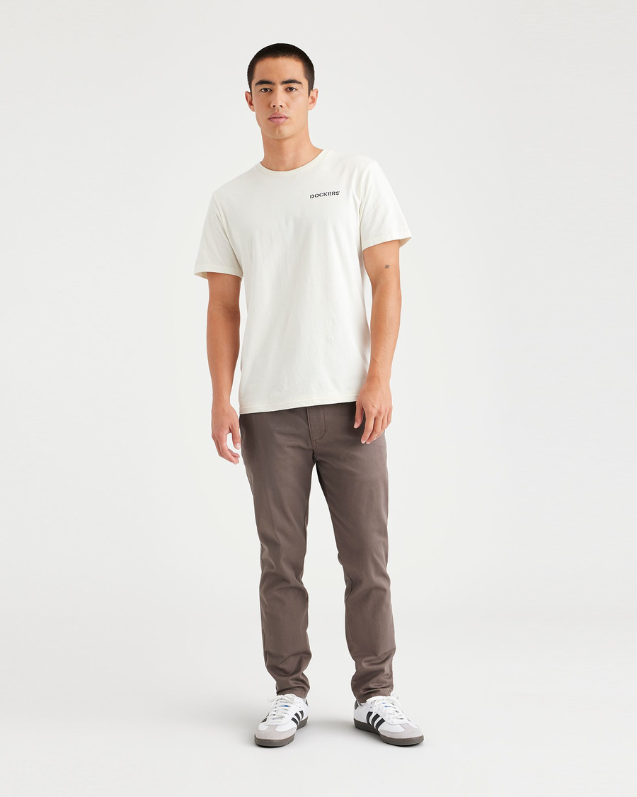 Front view of model wearing Coffee Quartz Men's Skinny Fit Original Chino Pants.