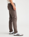 Side view of model wearing Coffee Quartz Men's Skinny Fit Original Chino Pants.