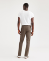 Back view of model wearing Coffee Quartz Men's Slim Fit Smart 360 Flex Alpha Chino Pants.