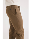 Side view of model wearing Cub Men's Slim Fit Smart 360 Flex California Chino Pants.