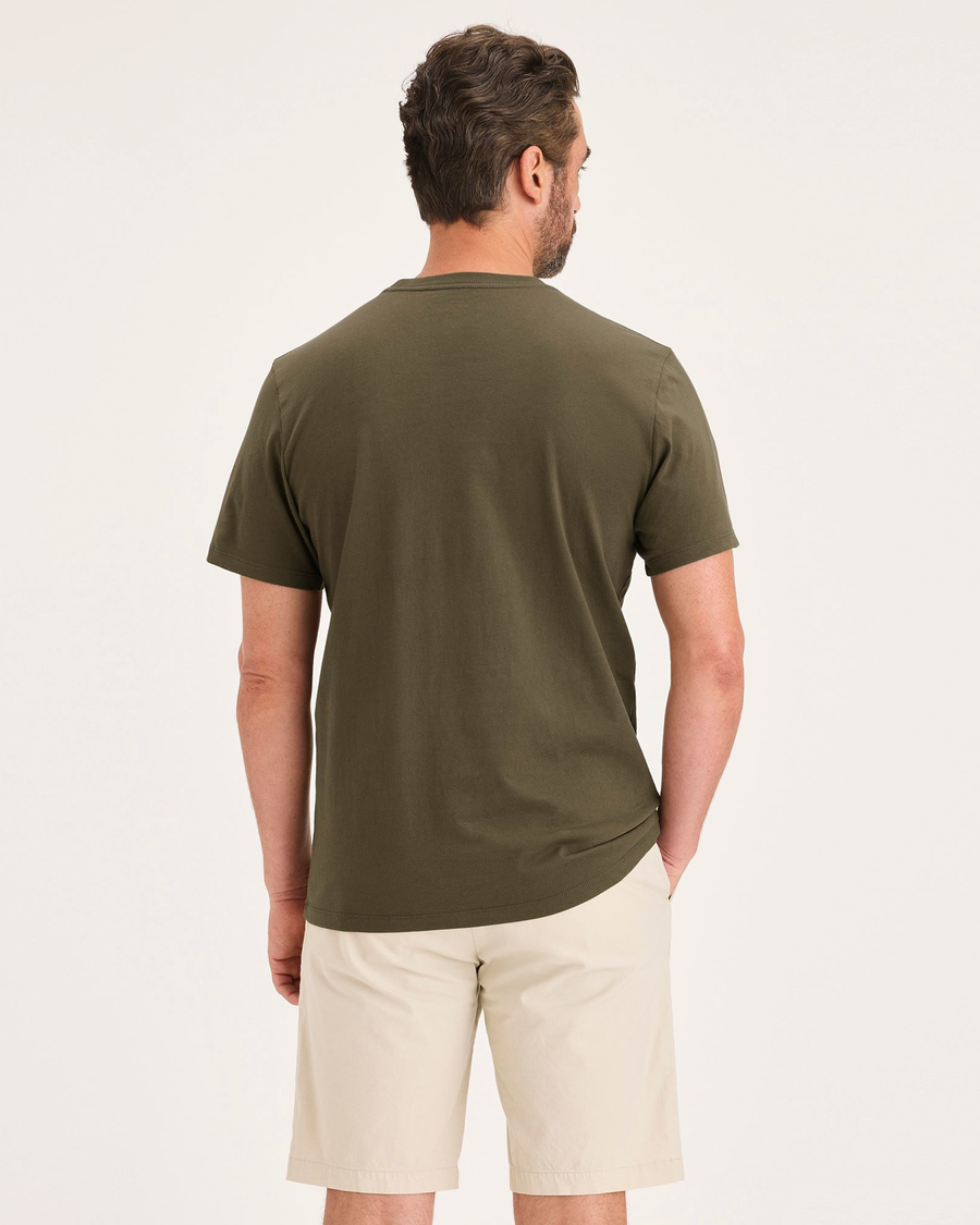 Back view of model wearing Dark Olive Men's Slim Fit Logo Tee.