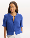 View of model wearing Deep Ultramarine Short Sleeve Cardigan, Regular Fit.