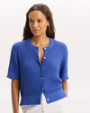 View of model wearing Deep Ultramarine Short Sleeve Cardigan, Regular Fit.