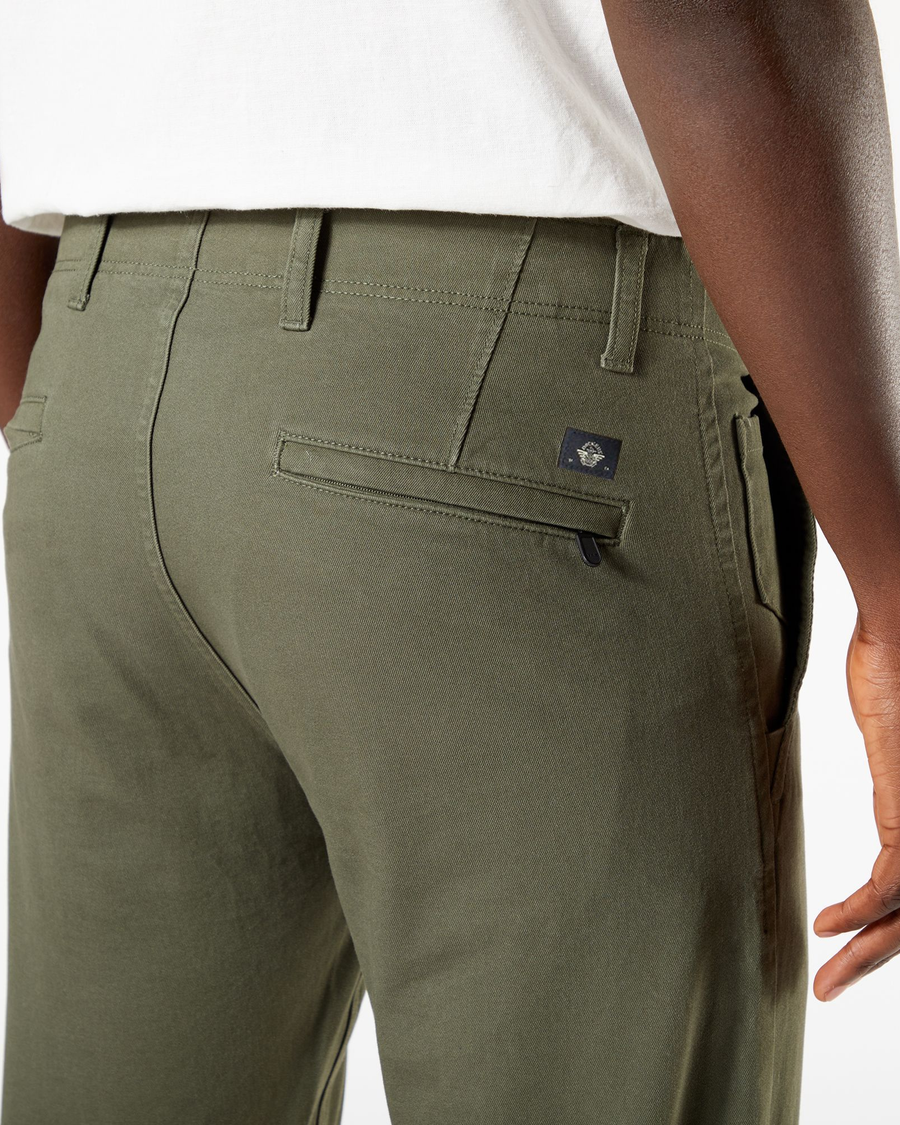 View of model wearing Dockers Olive Men's Slim Fit Smart 360 Flex Alpha Khaki Pants.