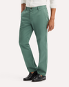 View of model wearing Duck Green Original Chino Pants, Slim Fit.