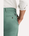 View of model wearing Duck Green Original Chino Pants, Slim Fit.