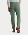 Back view of model wearing Duck Green Ultimate Chinos, Slim Fit.
