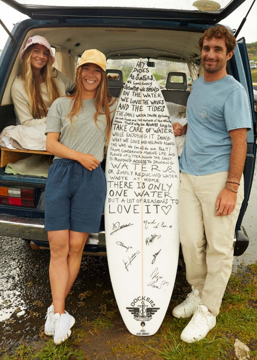 Dockers signing surf board