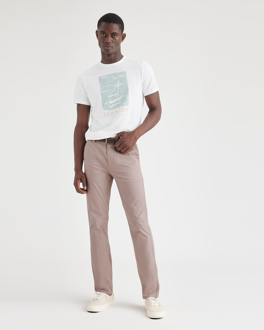 View of model wearing Fawn Men's Slim Fit Original Chino Pants.