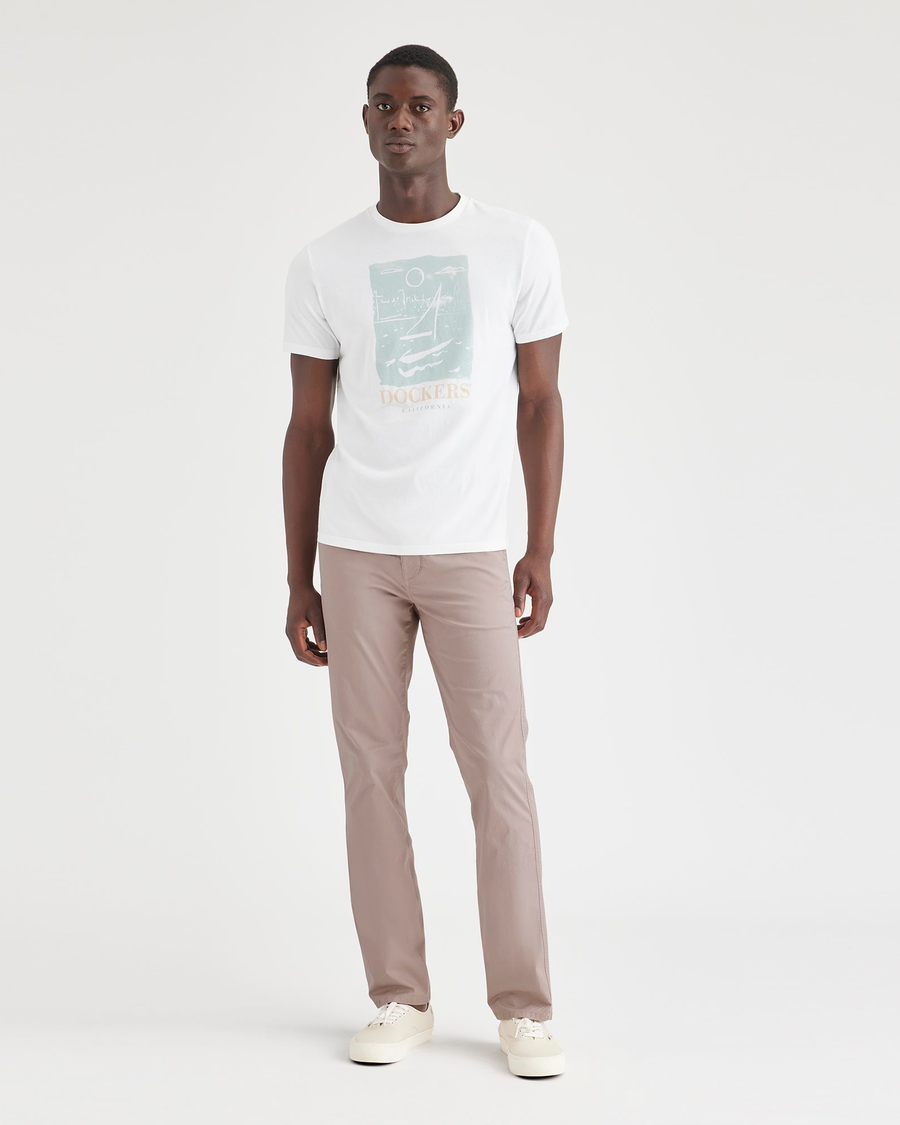 Front view of model wearing Fawn Men's Slim Fit Original Chino Pants.