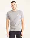 Front view of model wearing Foil Men's Slim Fit Logo Tee.