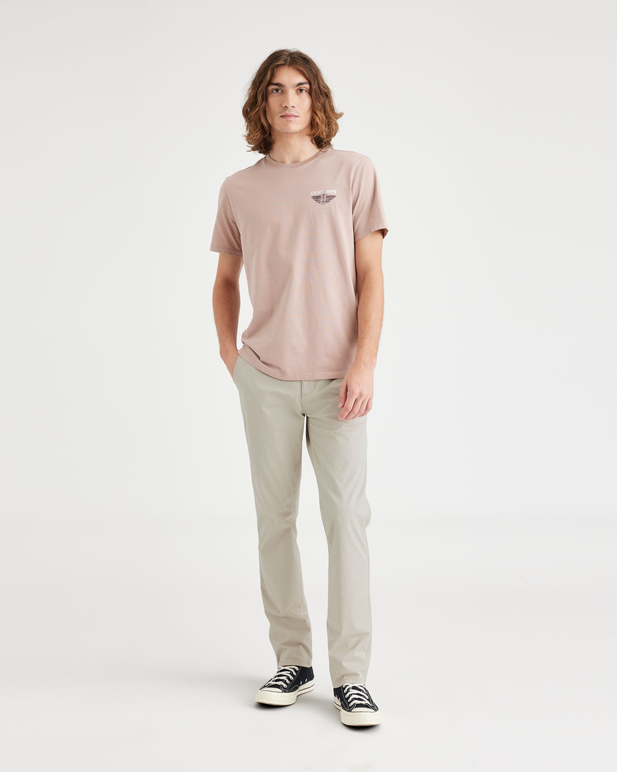 Front view of model wearing Grit Men's Slim Fit Original Chino Pants.