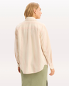 Back view of model wearing Hansen Peach Blush Relaxed Shirt.