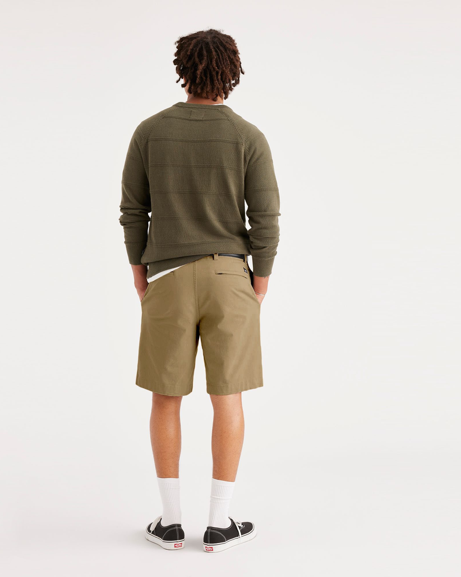 Back view of model wearing Harvest Gold Alpha Chino Shorts, Straight Fit.