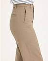 Side view of model wearing Harvest Gold Blake Chino Pants, High Straight Fit.