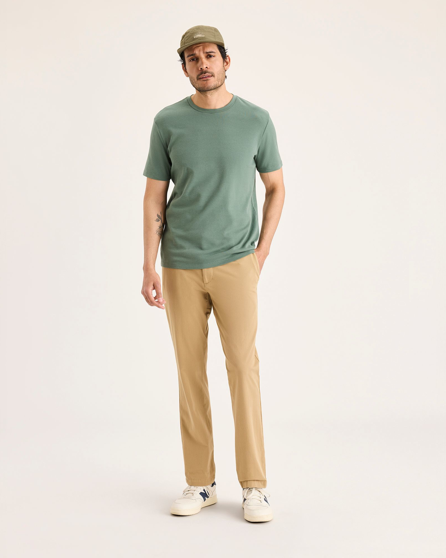 Front view of model wearing Harvest Gold Go Activeflex Chino, Slim Fit.