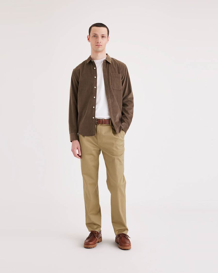 Front view of model wearing Harvest Gold Men's Relaxed Tapered Fit Original Chino Pants.