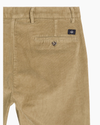 View of model wearing Harvest Gold Men's Slim Fit Smart 360 Flex Alpha Chino Pants.