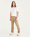 Front view of model wearing Harvest Gold Men's Straight Fit Utility Pants.