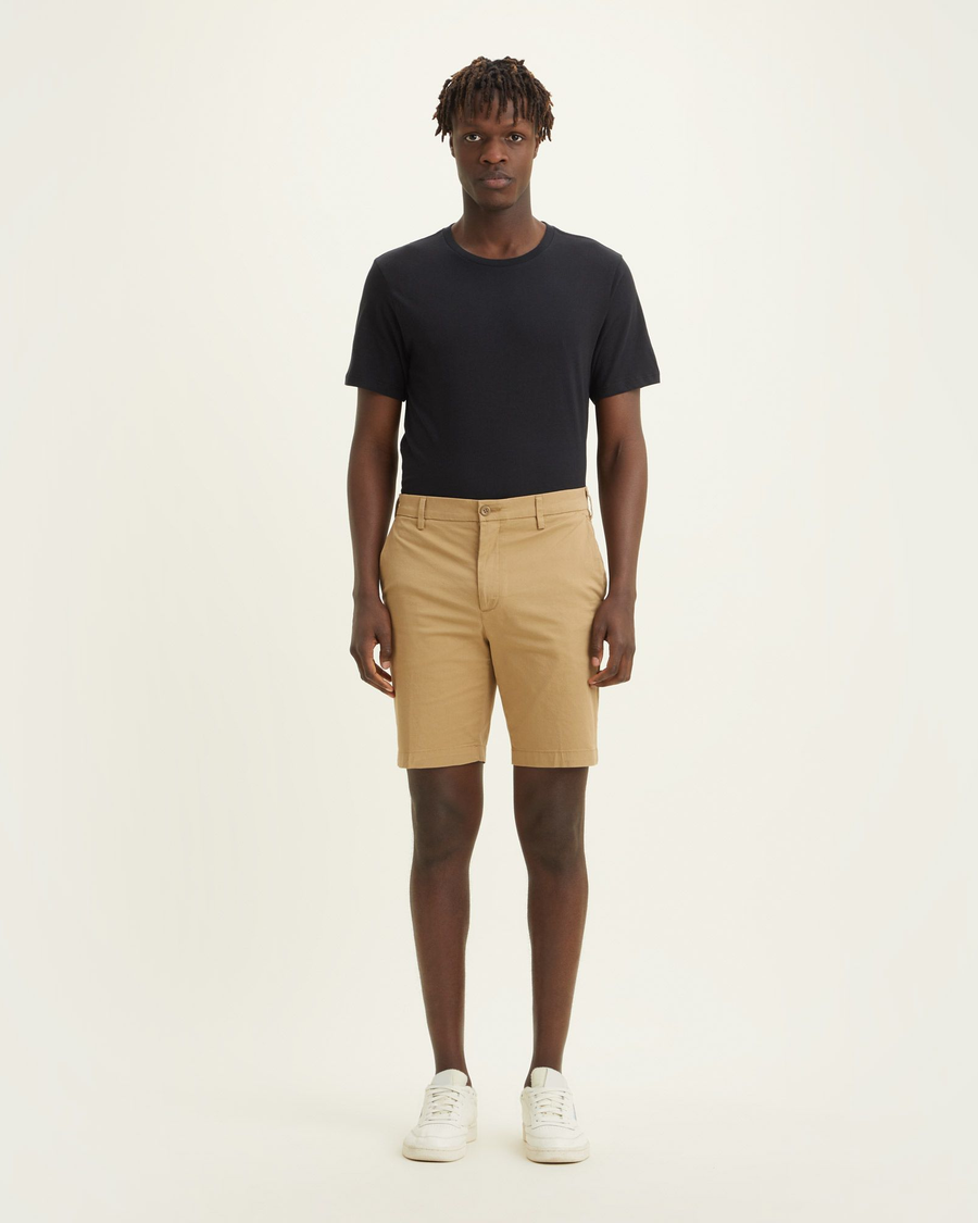 Front view of model wearing Harvest Gold Men's Supreme Flex Modern Chino Short.