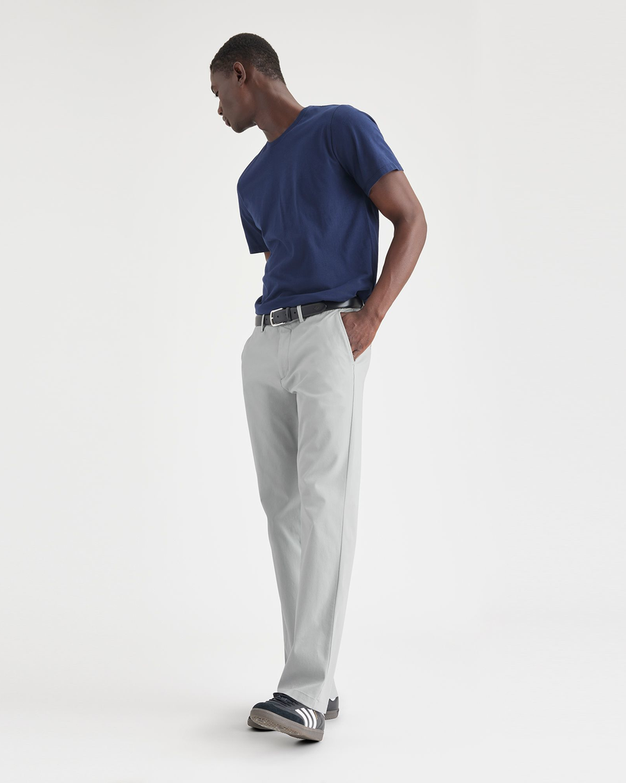 View of model wearing High-Rise Men's Slim Fit Smart 360 Flex Alpha Chino Pants.