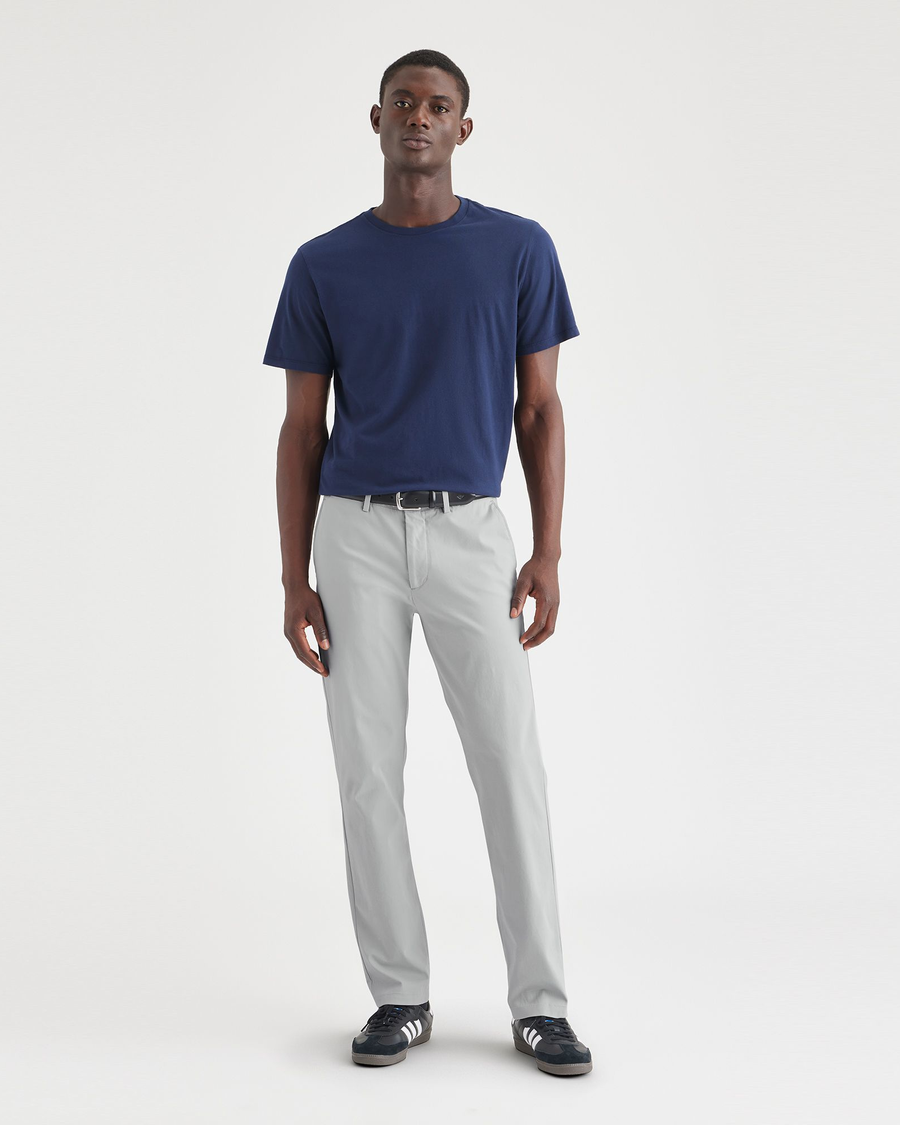 Front view of model wearing High-Rise Men's Slim Fit Smart 360 Flex Alpha Chino Pants.