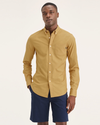 Front view of model wearing Honey Mustard Solid Men's Slim Fit 2 Button Collar Shirt.