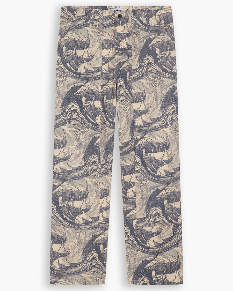 View of model wearing Ichabod Buttercream Eighty-Six Utility Pants, Loose Fit.